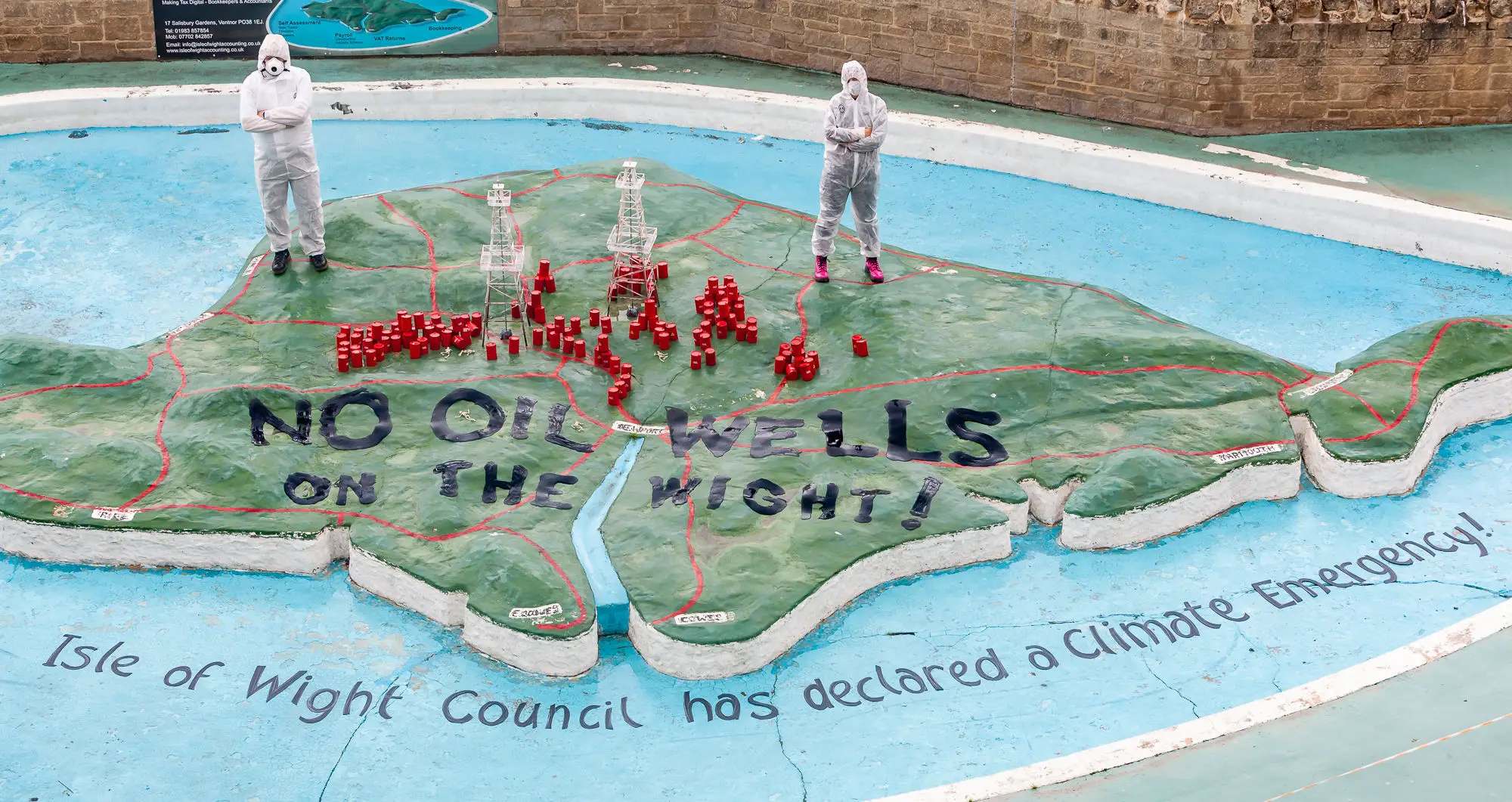 Environmentalists painted No oil wells on the Wight on the Ventnor Paddling Pool