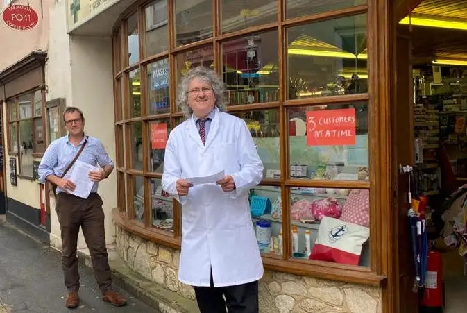 Tim Gibbs and Bob Seely outside Yarmouth Pharmacy