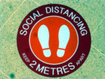social distancing keep 2m apart sticker on shop floor