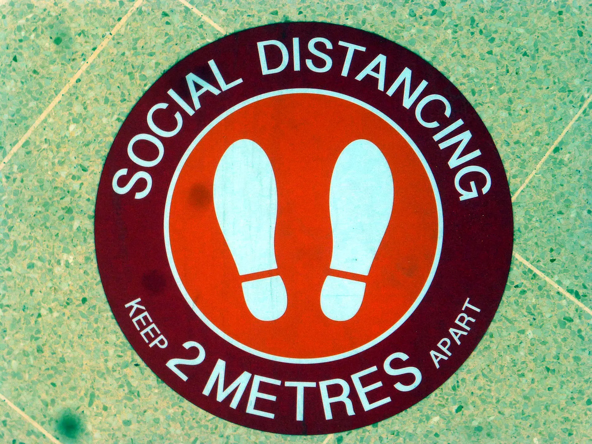social distancing keep 2m apart sticker on shop floor