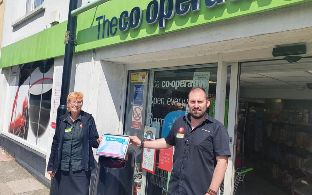 Pillar in Carisbrooke community clocks up 30 years at local store