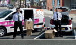 enforcement officers standing by their vans