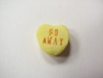 Go Away stamped on candy