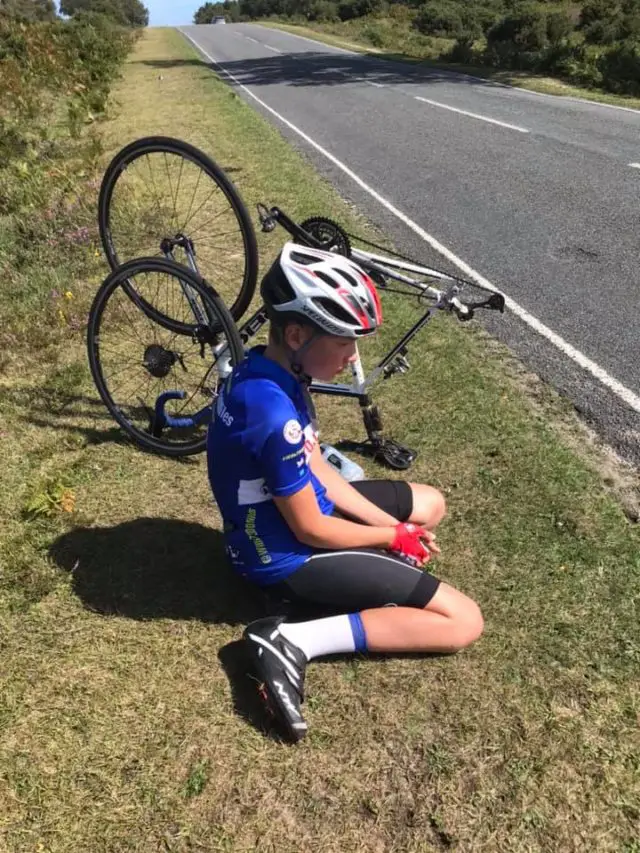 Will on the side of the road with his with broken bike