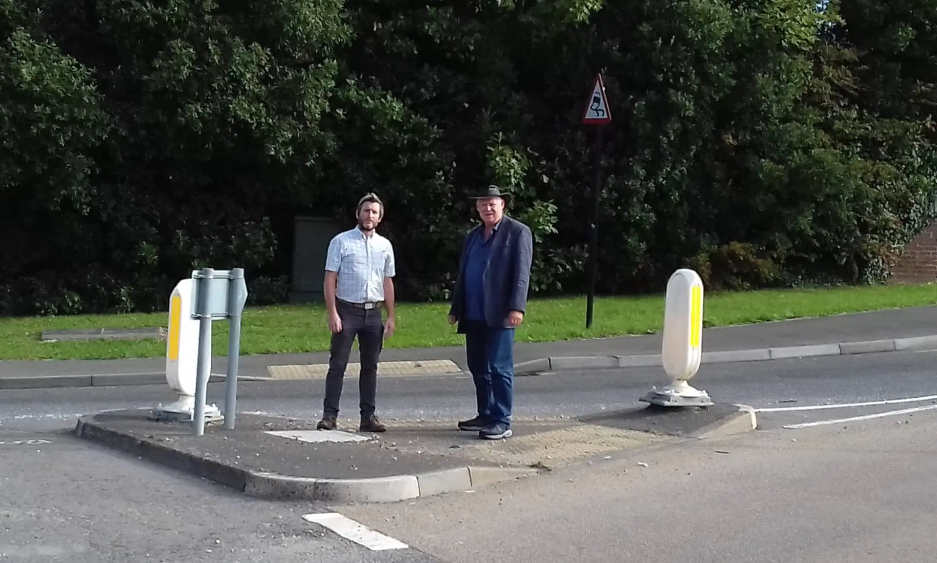 Matt Price and Geoff Brodie at the town's gateway