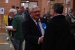 richard hollis shaking hands with nick stuart at the election count