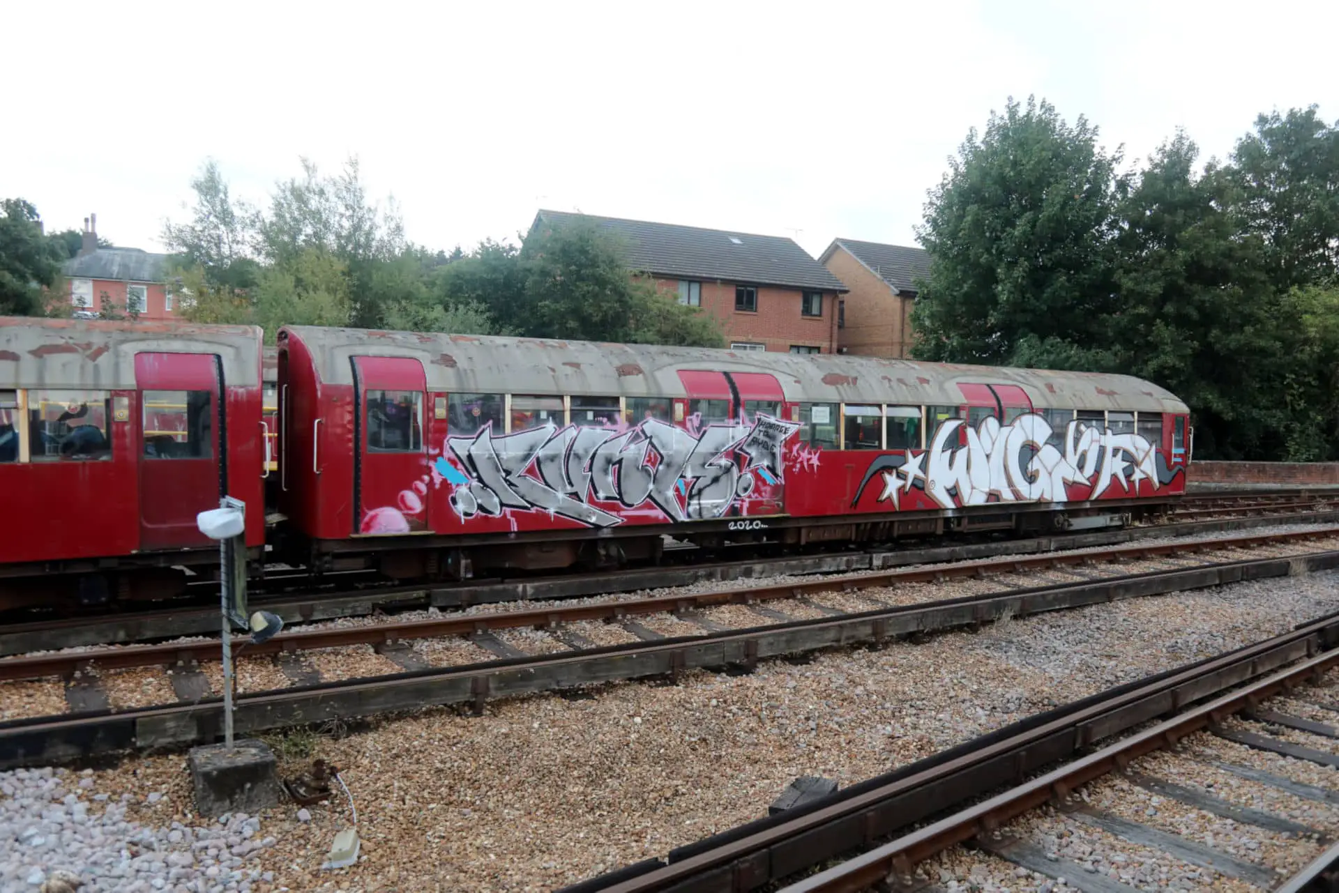 Graffiti covered train by Phil Marsh