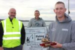 Wightlink’s Island Ports Operations Manager Martin Gulliver, Colin Webb from VBFC and award-winning angler Corey Duke