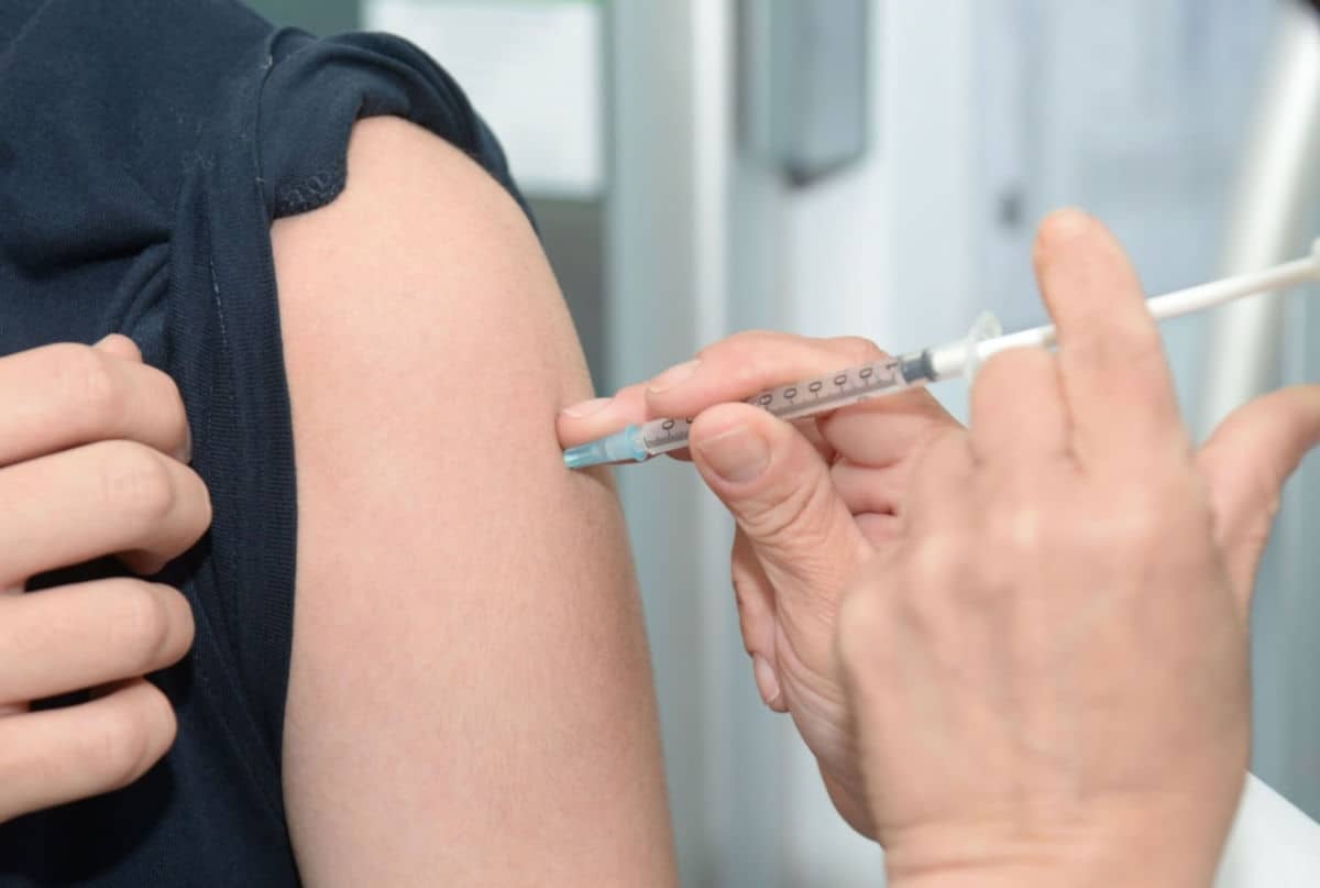 person getting a flu jab vaccination