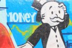 Graffiti showing the male Monopoly character with a top hat