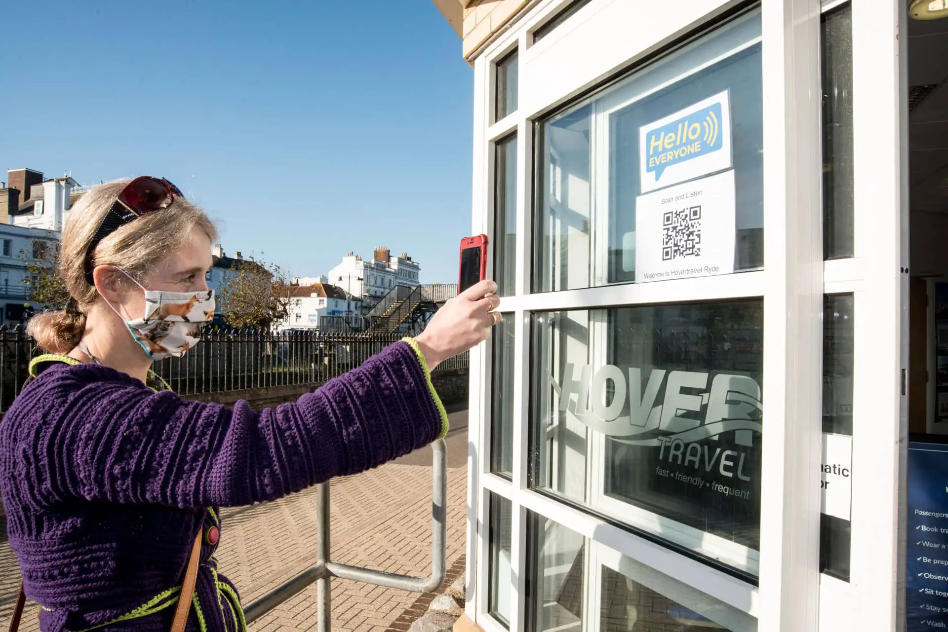 Sight for Wight Trustee and volunteer Ruth Hollingshead using the Hello Everyone QR code at Hovertravel’s Ryde Terminal
