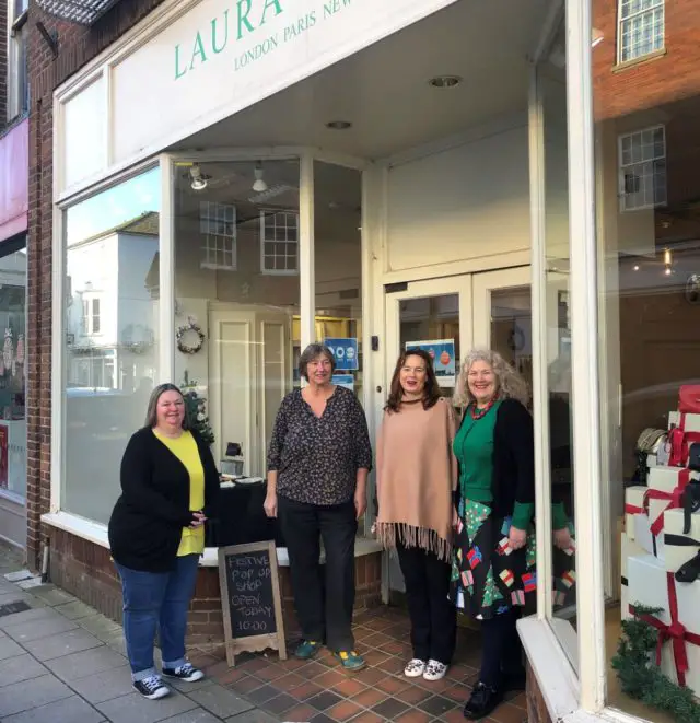 Cllr Jones-Evans with pop-up shopkeepers at 36 High Street
