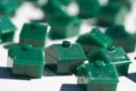 A bunch of green Monopoly houses