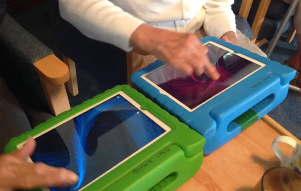 People in care home using ipads