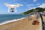 Drone flyuing over Ventnor beach in the summer