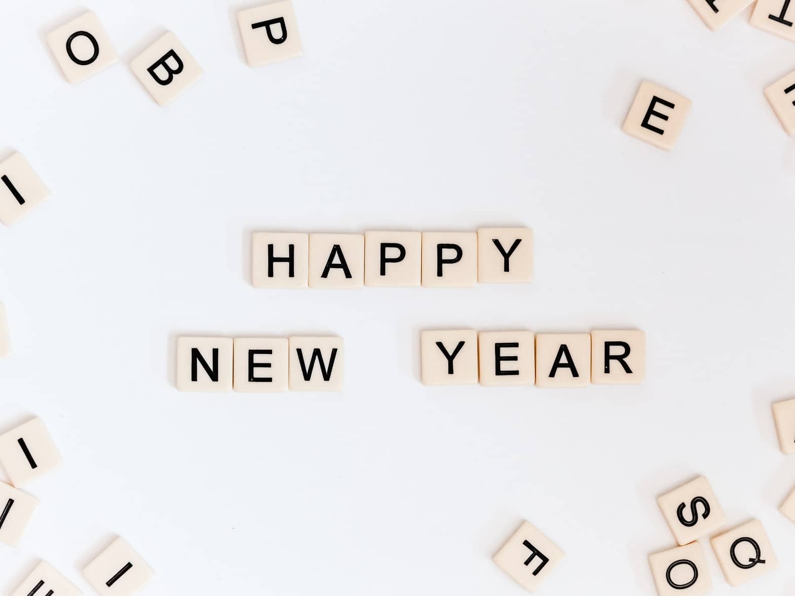 scrabble letters spelling out Happy New Year