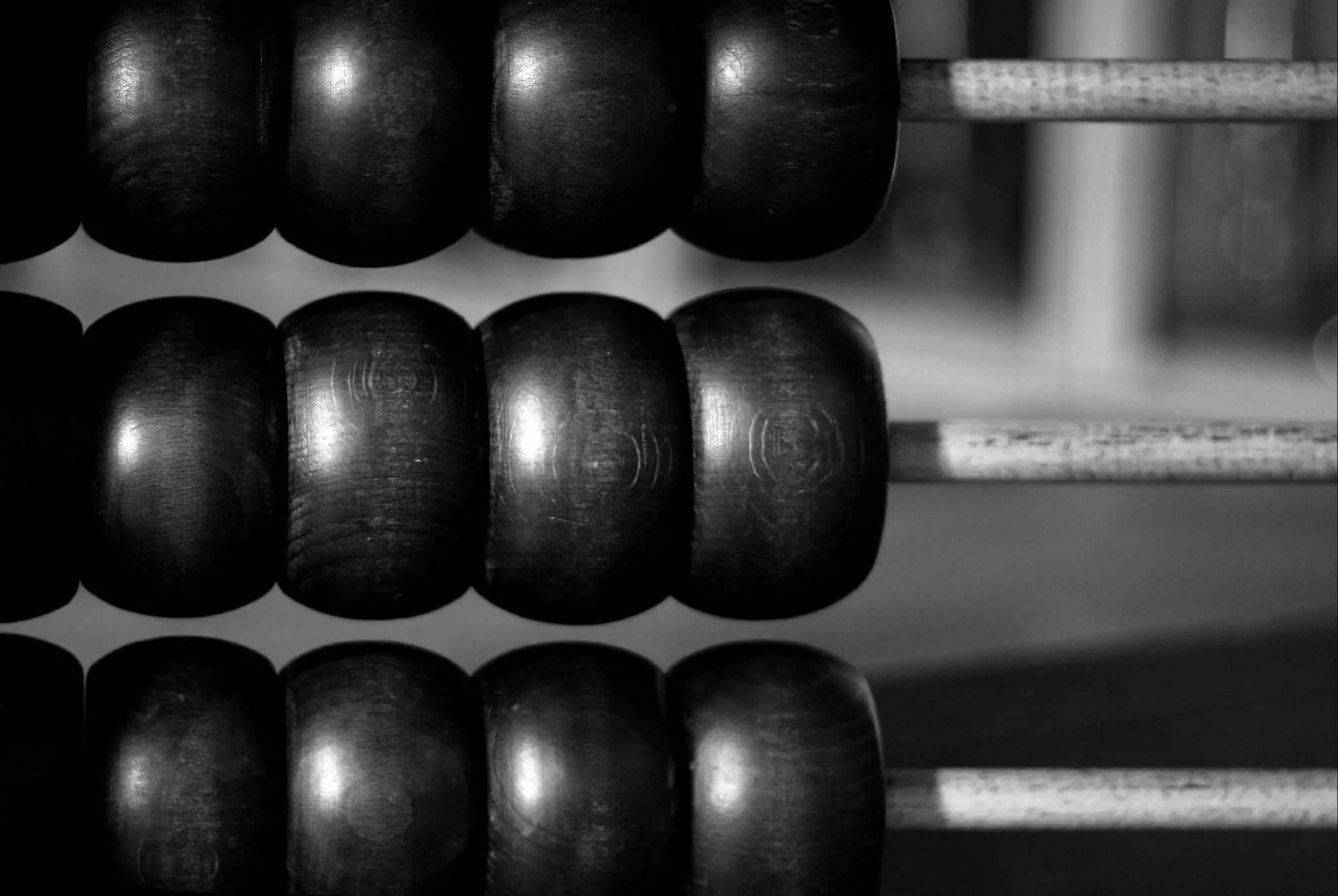 Black and white close up shot of an abacus