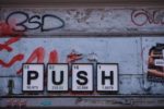 push letter on wall