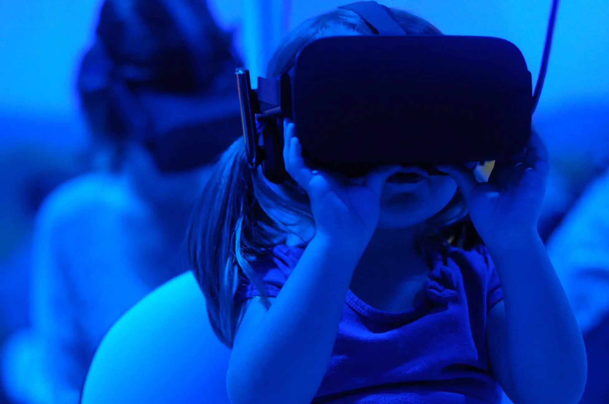 young girl wearing a vr headset