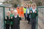 kids and island roads staff on Alresford Bridge