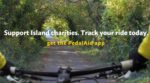 Person cycling down cycle track with support island charities text overlaid