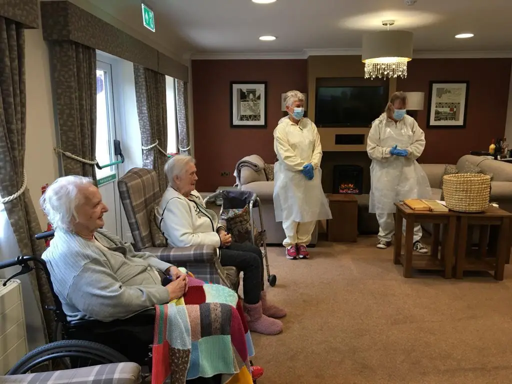 Terri and Carol from the Ark Park Apiary giving a presentation to residents of the care home