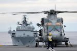 Helicopter on aircraft carrier