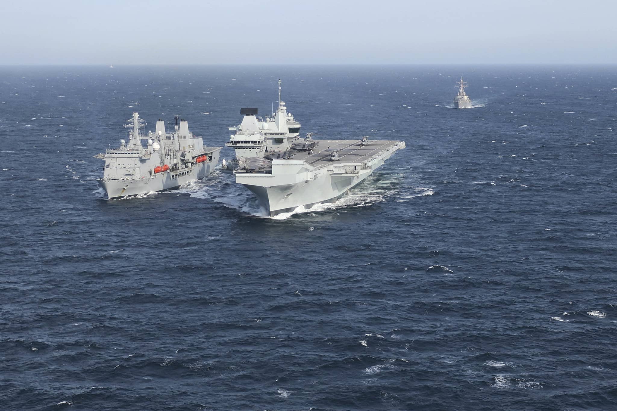 HMS Queen Elizabeth and RFA Fort Victoria at sea