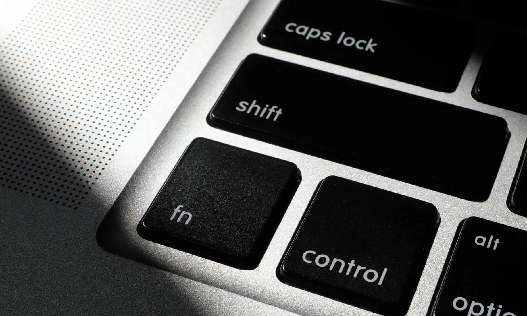 Laptop keyboard showing shift caps lock and control buttons