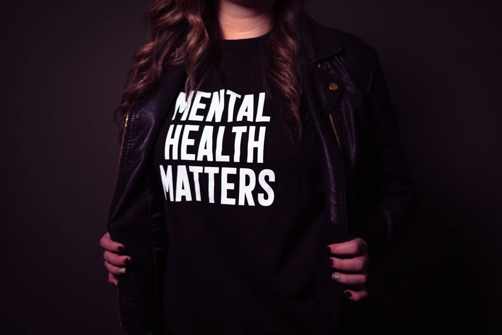 woman with mental health matters t-shirt by Matthew Ball