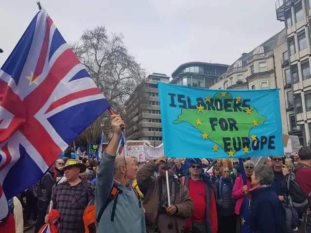 Islanders for Europe on a march with banner