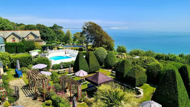 The garden and pool at Luccombe Hall Hotel 