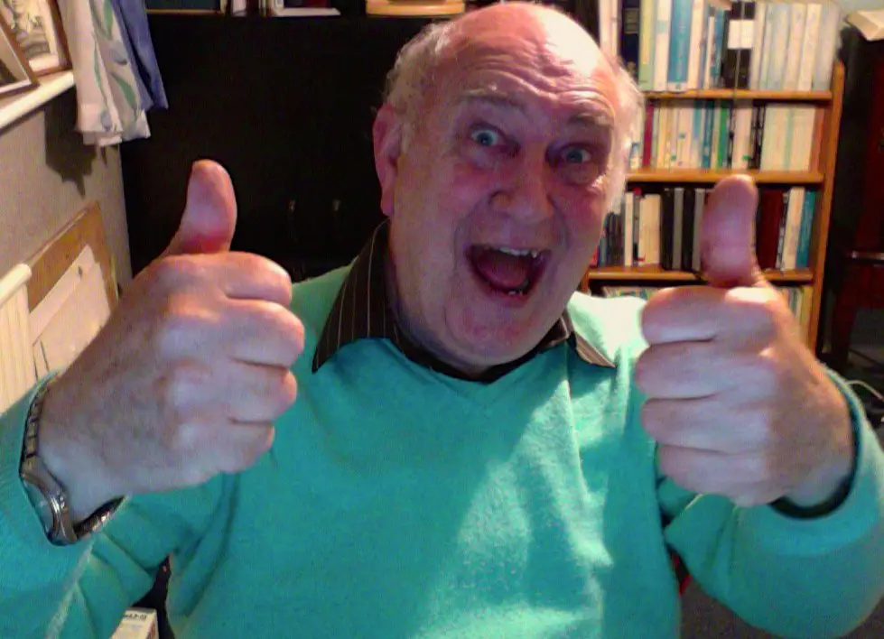 Older man with thumbs up