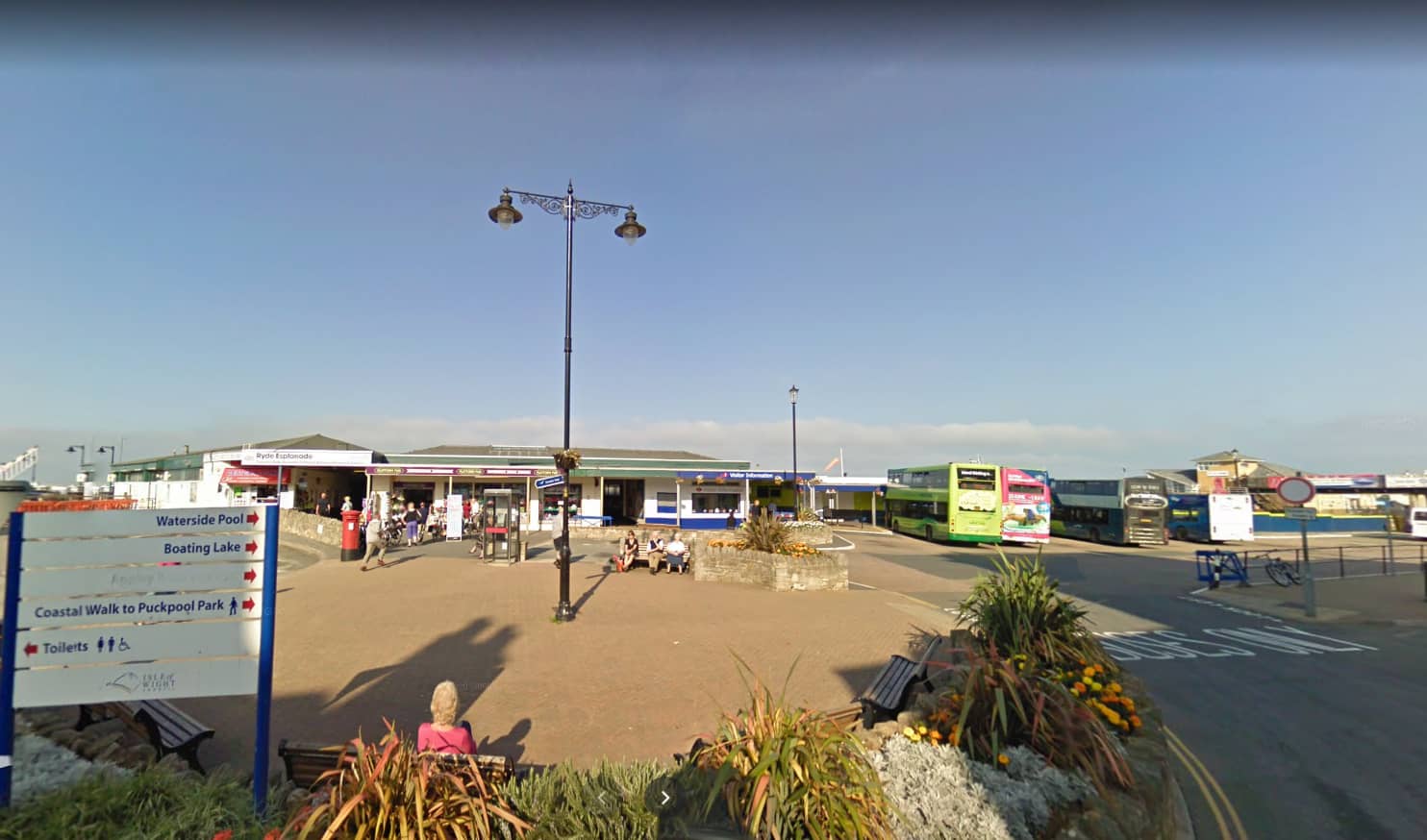 Ryde Interchange with people milling about in the sun