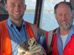 Ben Gibson, Deck Mate, and Mark Holland, Deck hand, with the kitten