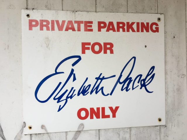 Private parking sign at back of building