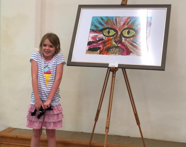 Elizabeth with her artwork called ‘It’s a cat’