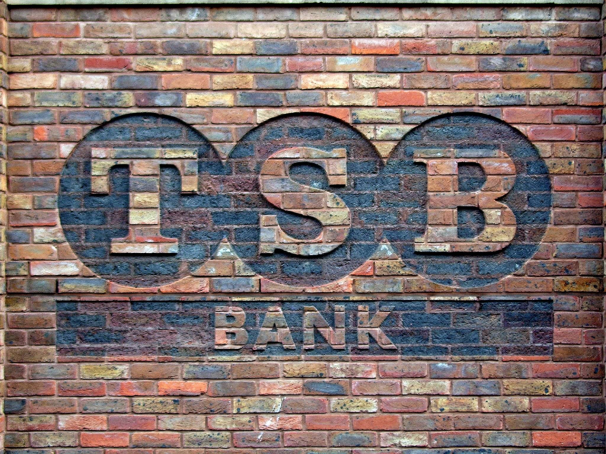 TSB branded into brick wall