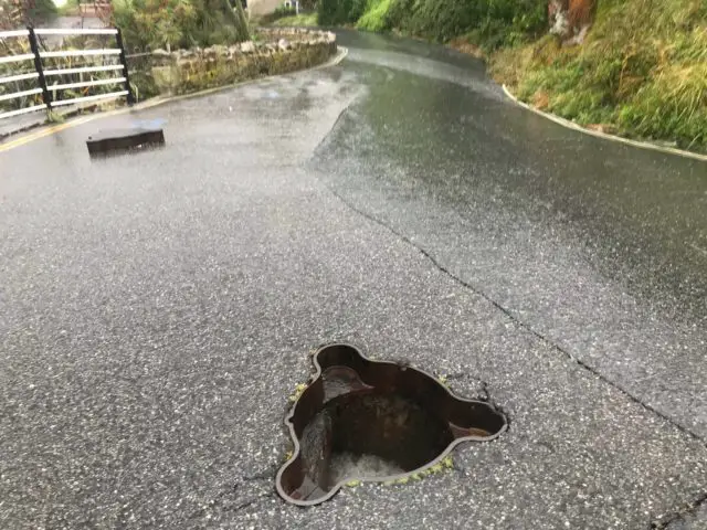 Water surge lifts manhole cover on Ventnor Cascade by Paul Knights