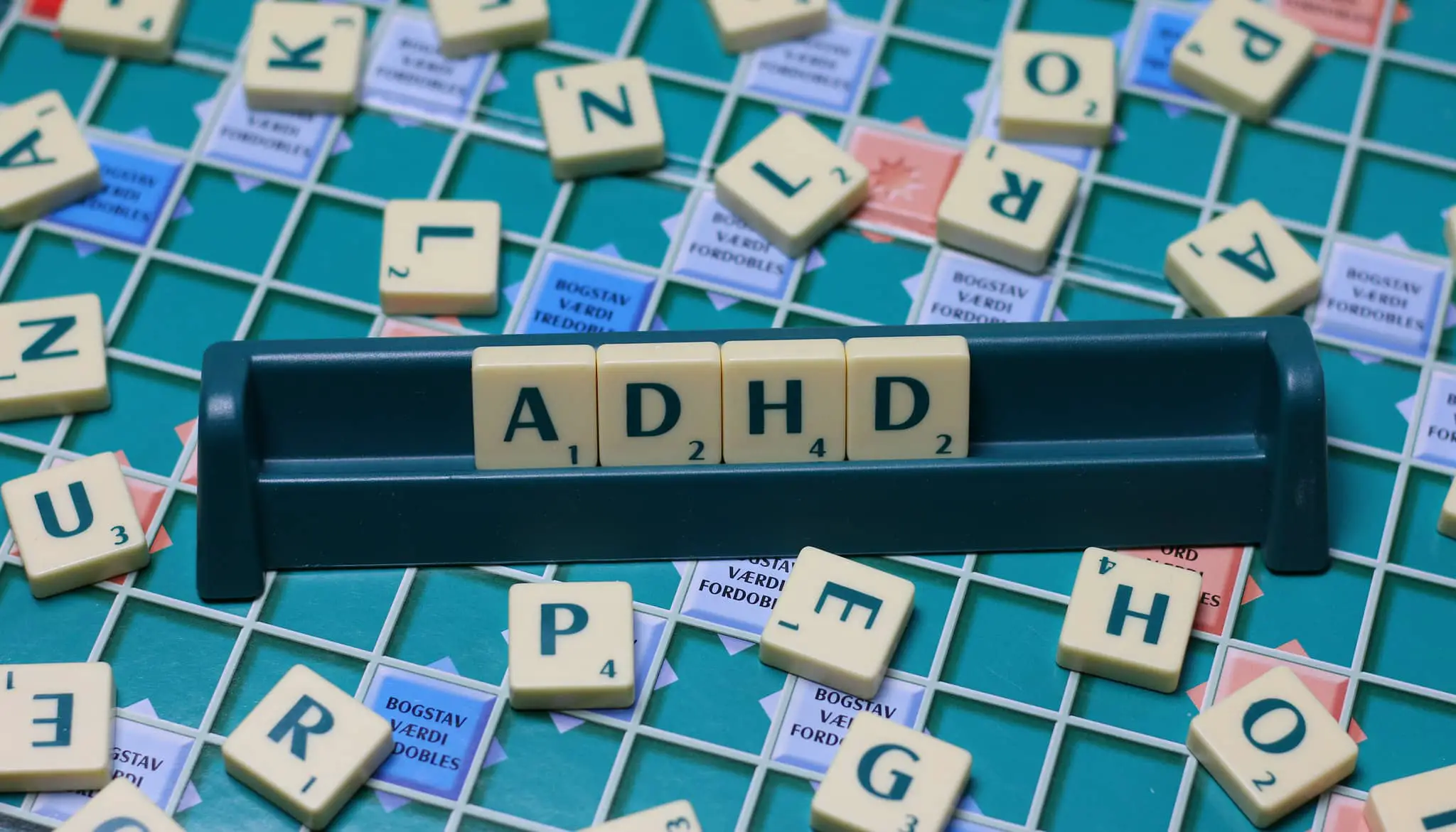 ADHD letters on a scrabble board