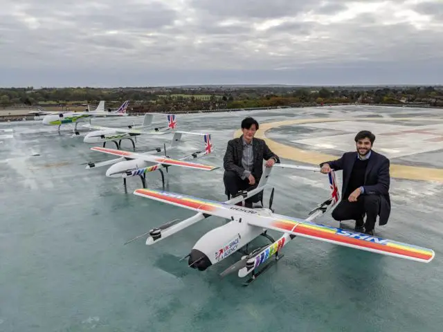 Christopher and Hammad with the drone fleet