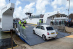 Car loading on First day of floating bridge by Allan Marsh