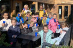Queensgate Foundation Primary School pupils drinking fresh milk from the Guernsey cows at Briddlesford Farm