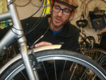 Johnny Dawson mending a bike