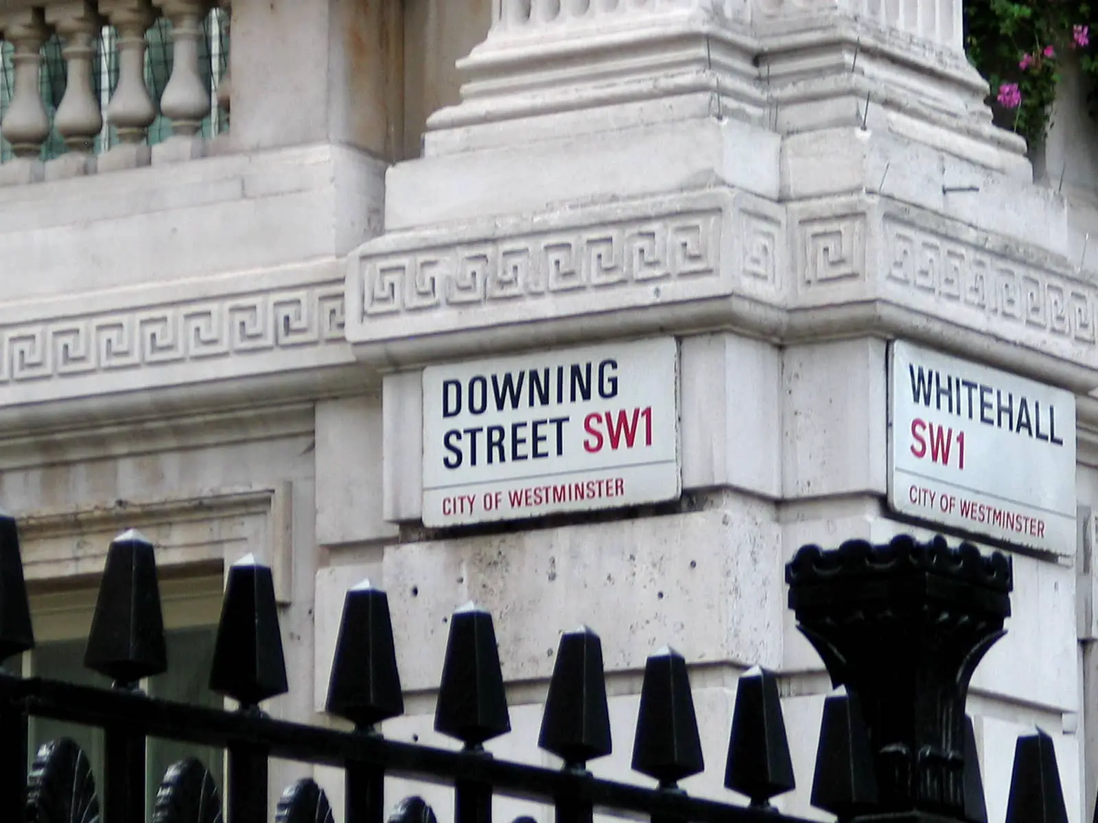 Downing Street road sign and railings
