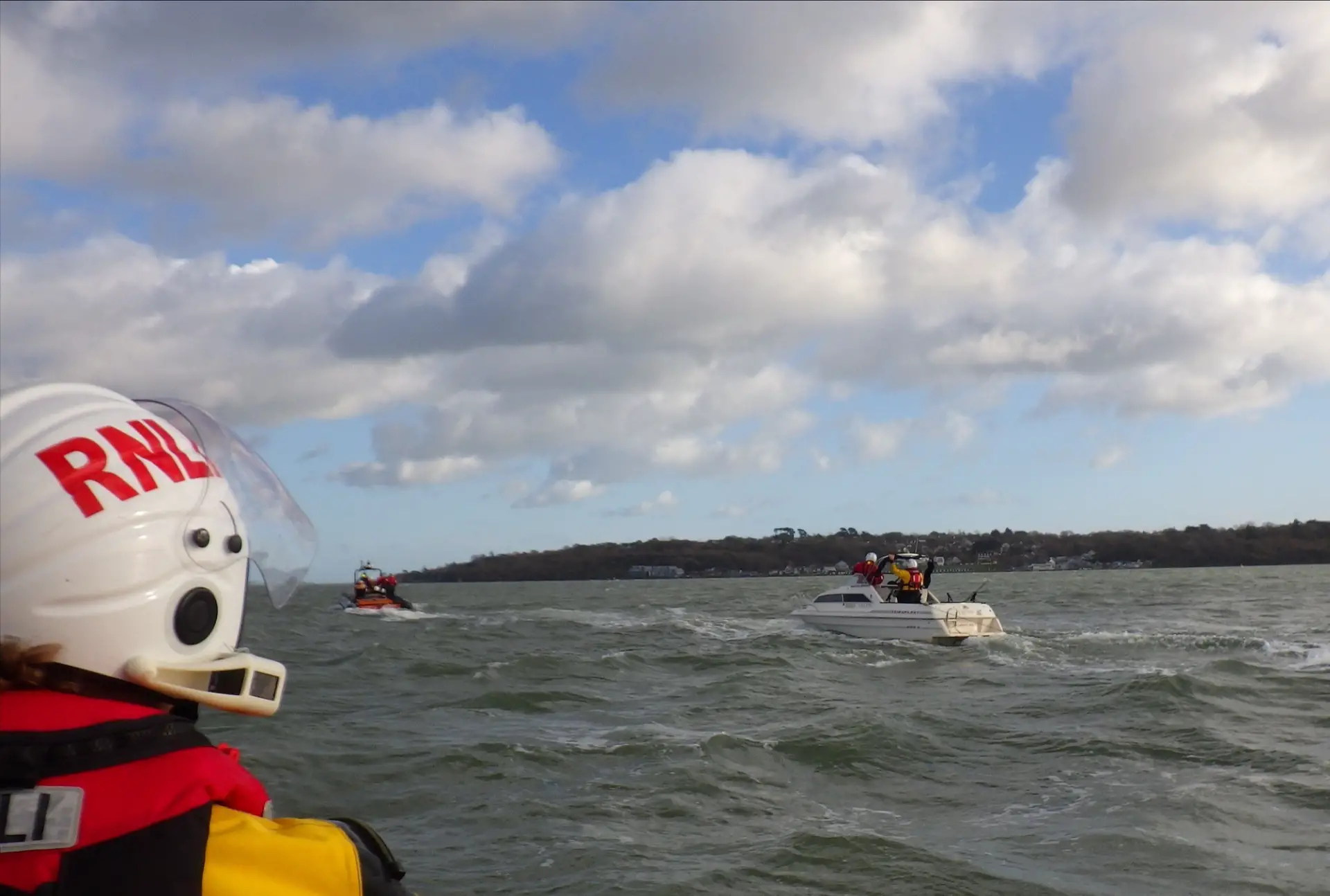 Leaking fishing boat out on the water with Cowes RNLI