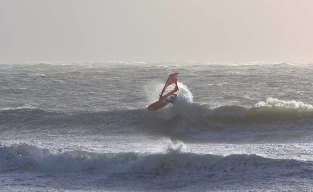 Ross Williams windsurfing in Monks Bay by Paul Knights