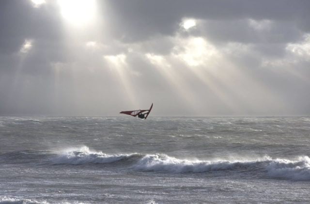 Ross Williams windsurfing in Monks Bay by Paul Knights