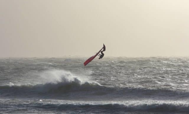 Ross Williams windsurfing in Monks Bay by Paul Knights