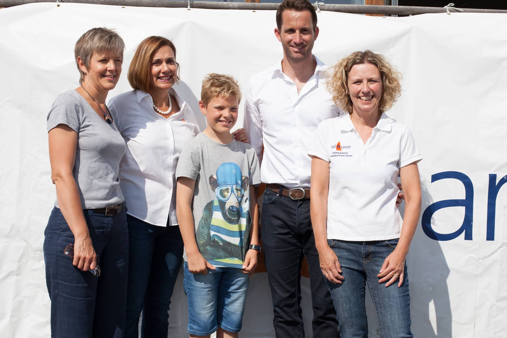 ail 4 Cancer’s Patron Sir Ben Ainslie enjoys a sailing day with a group of people helped by the charity